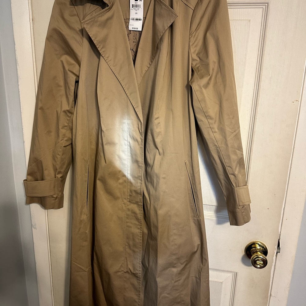 Elegant plus size long trench coat with back lace never worn with tags.